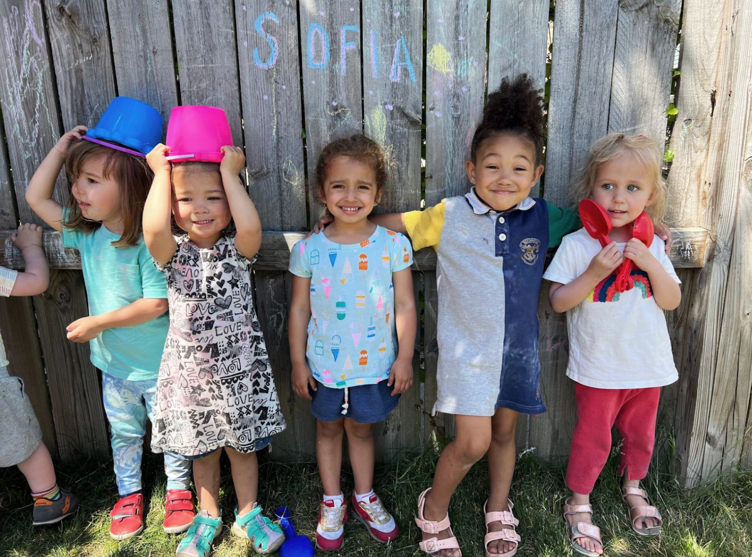 Kids at Le Village Cowork playing outside together