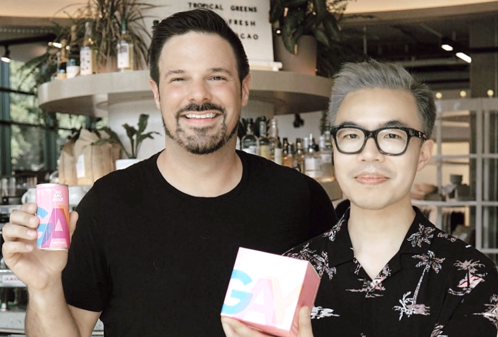 Josh Campbell (left) and Tim Chan (right) photographed at their business with products. (5 Inspiring LGBTQ Entrepreneurs - Guidant Blog). 