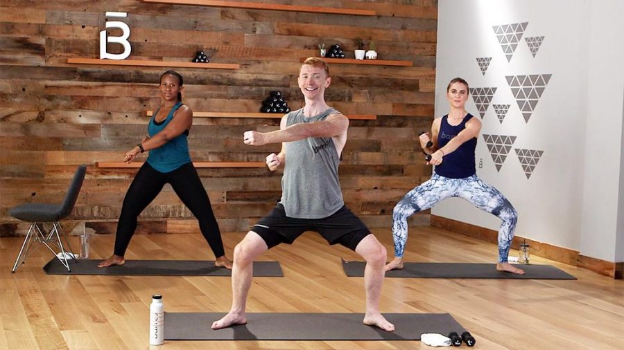 Three coaches in position on workout mats demonstrating a workout pose - Photo from Barre3. (Hottest Fitness Franchises of 2023-2024 - Guidant Blog).