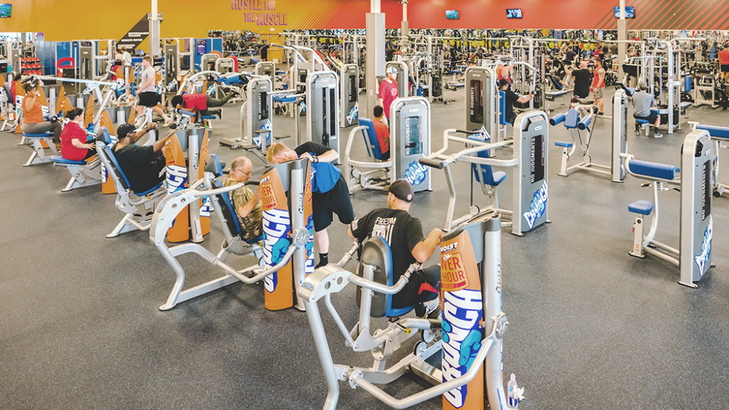 Crunch gym interior with workout equipment. (Hottest Fitness Franchises of 2023-2024 - Guidant Blog).