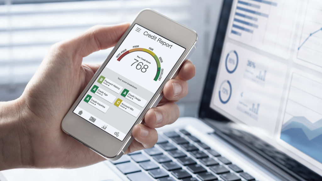 Hand holding a phone with a credit score report. (Questions to ask When Choosing Small Business Funding - Guidant Blog.)
