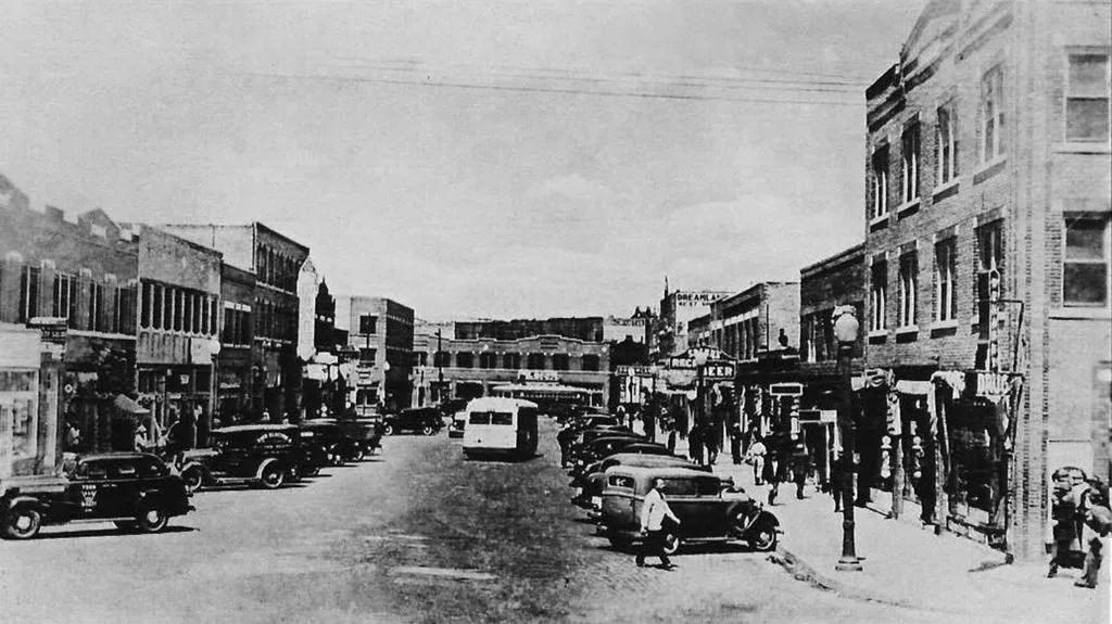 A look at Greenwood Avenue prior to its devastation during the 1921 race massacre. Courtesy of Greenwood Cultural Center/Archive Photos. Guidant Blog - Exploring the Legacy of Black Wall Street Today. 